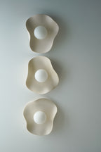 Aplique de pared/lámpara de cerámica color nude cremoso