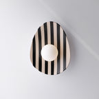 Applique murale en céramique à rayures noires et blanches