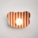 Lámpara de pared/aplique de cerámica con diseño de osito de peluche a rayas para habitación infantil.